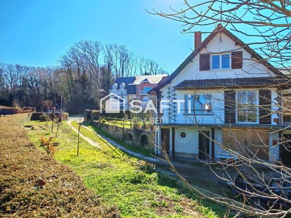 Maison avec garage et jardin