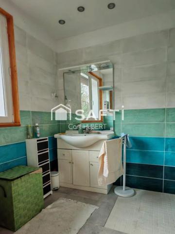 Maison avec garage et jardin