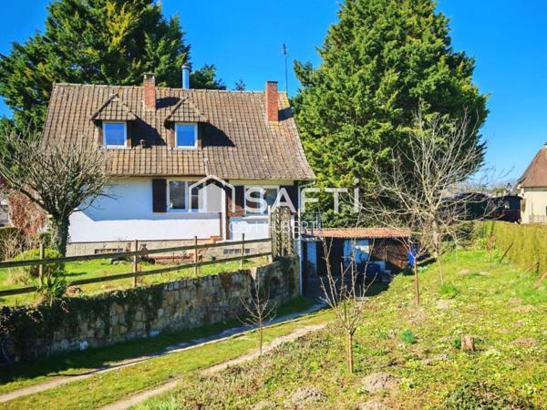 Maison avec garage et jardin