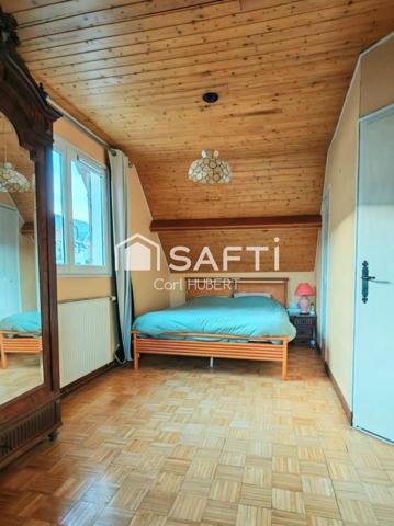 Maison avec garage et jardin