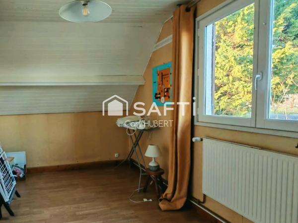 Maison avec garage et jardin