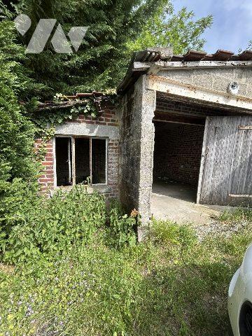 ancienne maison éclusière à rénover avec jardin et garage