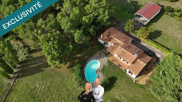 Maison avec grand terrain au calme