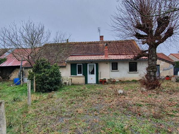 maison de village 3 piéces de 58 m2 et jardin 890 m2