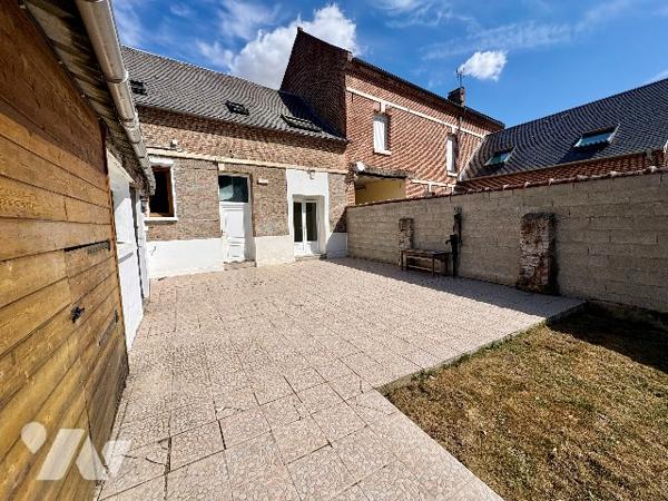 Maison familiale avec jardin et dépendances