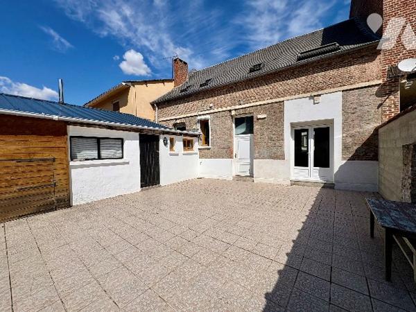 Maison familiale avec jardin et dépendances