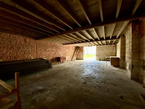 Double garage 200m² environ