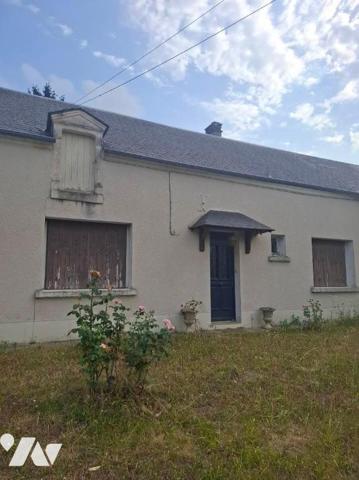Maison composée d'une entrée, wc, salle de bain, chaufferie, couloir, salon salle à manger, deu...