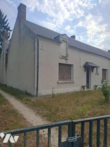 Maison composée d'une entrée, wc, salle de bain, chaufferie, couloir, salon salle à manger, deu...