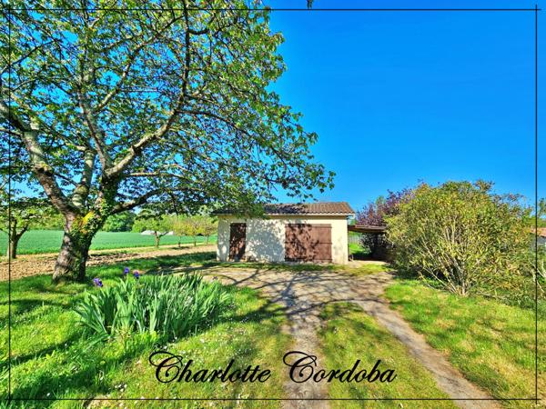 Maison de 4 pièces, grand terrain non attenant avec garage, petit budget