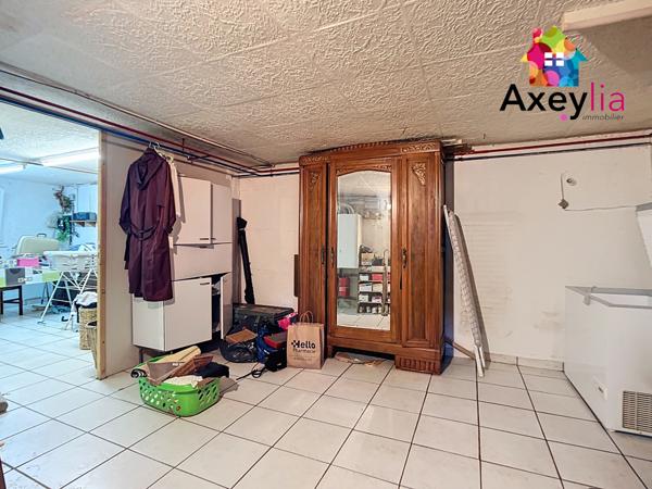 Mably (42300) A VENDRE - MABLY - MAISON ÉLEVÉE SUR SOUS-SOL SEMI ENTERRÉ AVEC TROIS CHAMBRES, DEUX GARAGES ET TERRAIN CONSTR