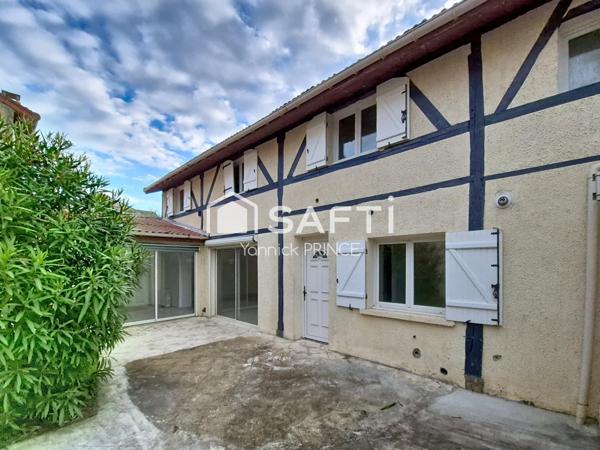 Maison de ville avec jardin, proche coeur de ville