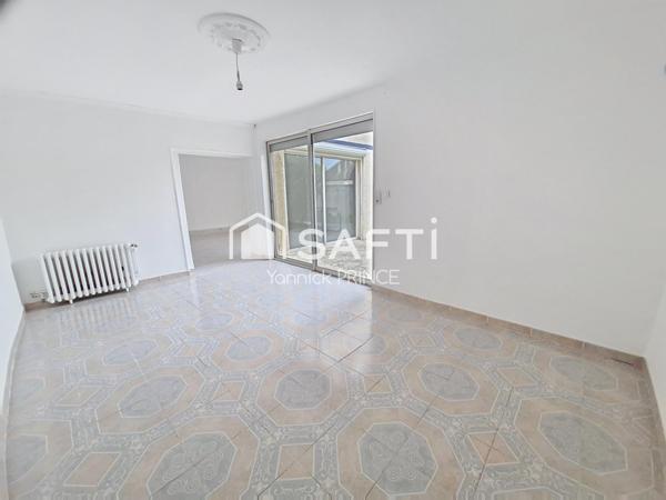 Maison de ville avec jardin, proche coeur de ville