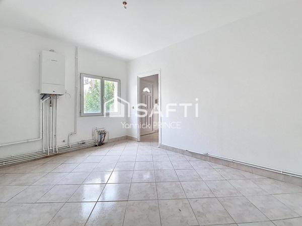 Maison de ville avec jardin, proche coeur de ville