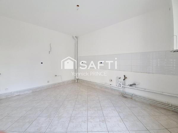 Maison de ville avec jardin, proche coeur de ville