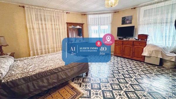 Maison de 168,32 m2 avec possibilité de construction et division comprenant 5 chambres, 2 salons et 2 garages