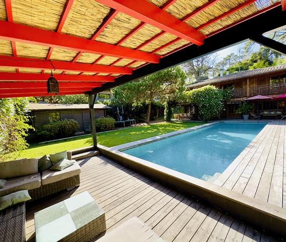Cap Ferret, Port de la Vigne, ravissante Villa bois « esprit bassin » 145m2 habitable nichée au milieu d’un magnifique jardin paysagé de 1000 m2 avec grande piscine