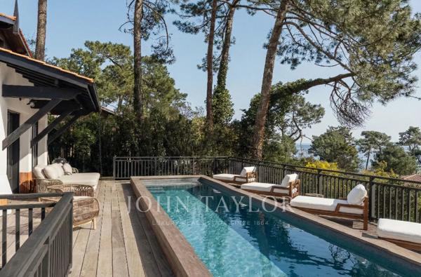 Cap-Ferret – Entre Ciel et Bassin : Propriété d’exception avec vue panoramique