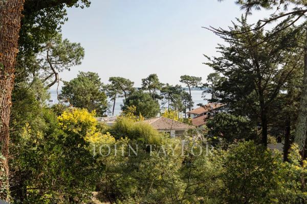 Cap-Ferret – Entre Ciel et Bassin : Propriété d’exception avec vue panoramique