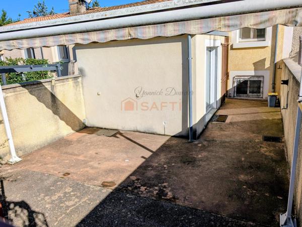 Maison de ville atypique avec balcon et terrasse
