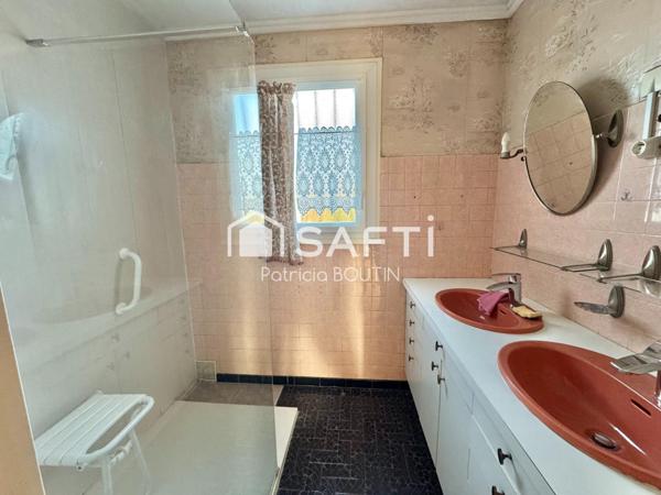 PAVILLON SUR SOUS SOL 3 CHAMBRES ET 3 GARAGES A COULON