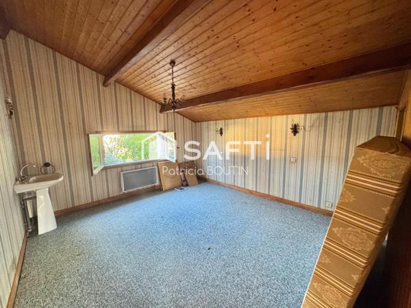 PAVILLON SUR SOUS SOL 3 CHAMBRES ET 3 GARAGES A COULON