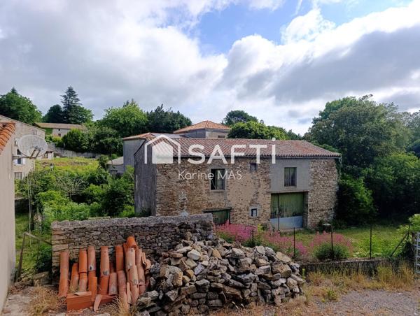 Maison avec remise et jardin