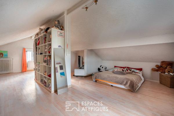 Maison familiale avec jardin et local commercial