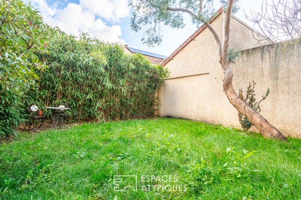 Maison familiale avec jardin et local commercial