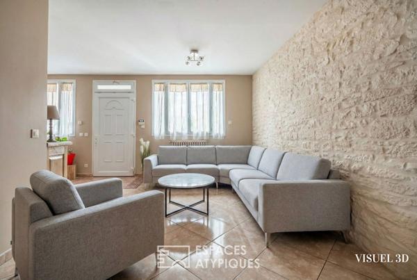 Maison familiale avec jardin et local commercial