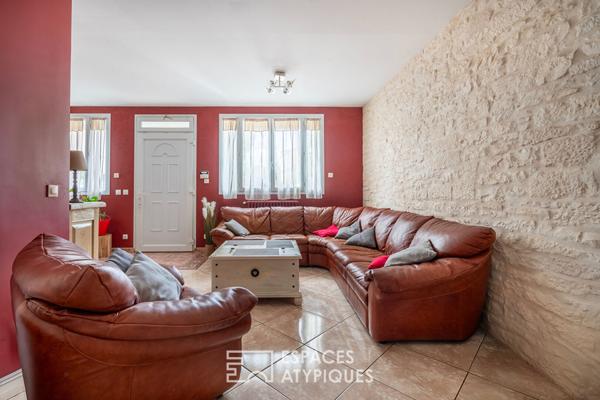 Maison familiale avec jardin et local commercial