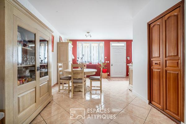 Maison familiale avec jardin et local commercial