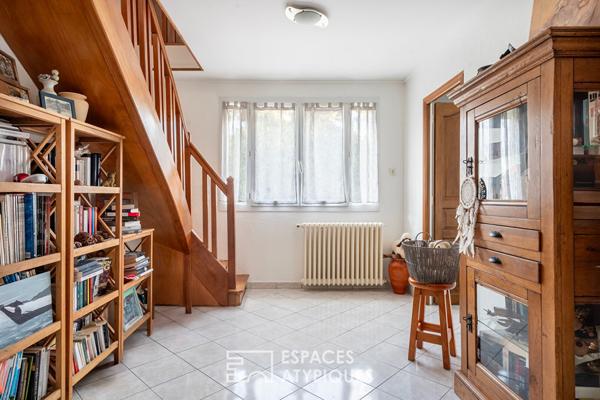 Maison familiale avec jardin et local commercial