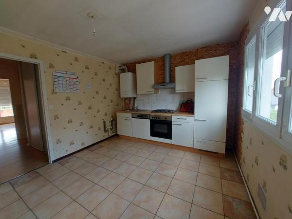APPARTEMENT 96 M² AVEC GARAGE 