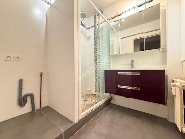 Appartement Puteaux 4 pièces de 96 m² avec balcon, cave et double parking