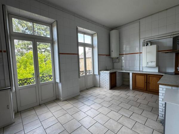 Bien de caractère dans un ancien hôtel particulier