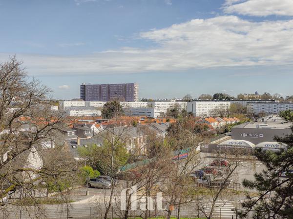 Appartement T3 63 m² avec balcon, parking et cave