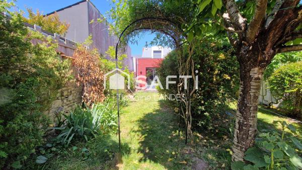 Belle maison spacieuse avec 4 chambres et jardin.