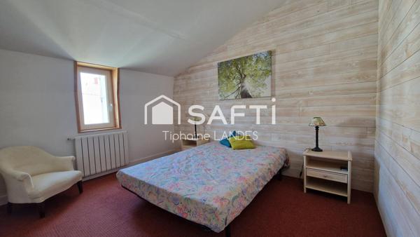 Belle maison spacieuse avec 4 chambres et jardin.