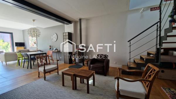 Belle maison spacieuse avec 4 chambres et jardin.