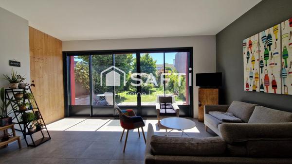 Belle maison spacieuse avec 4 chambres et jardin.