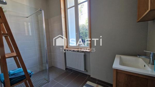 Belle maison spacieuse avec 4 chambres et jardin.