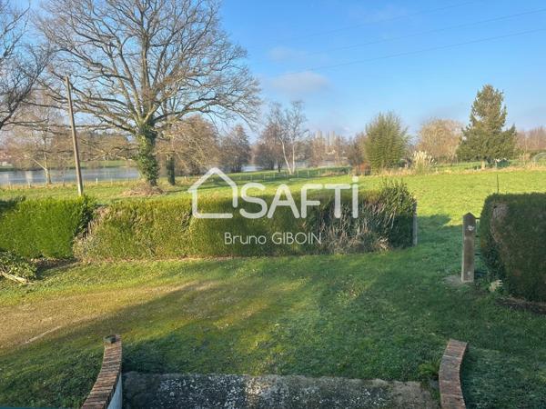 Maison plain pied vue sur étang, 138 m², 4 pièces.