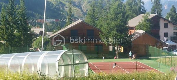 Triplex en pied de pistes,  dans  la résidence le Hameau,  2 chambres, vue sur la station et les pistes...