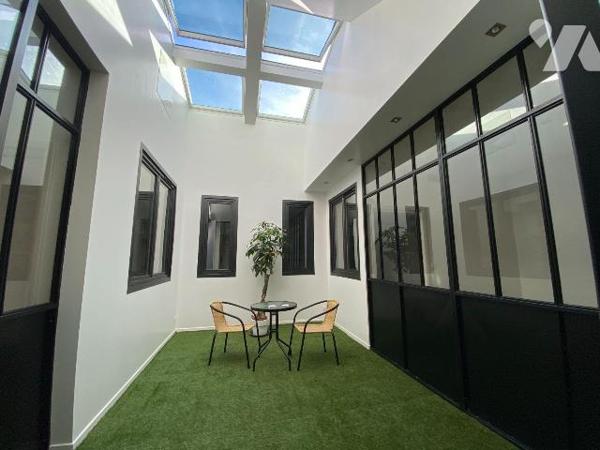 AURILLAC, quartier gare, appartement de plain-pied entièrement rénové dans un esprit loft, comp...