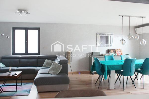 Maison spacieuse avec terrasse et jardin