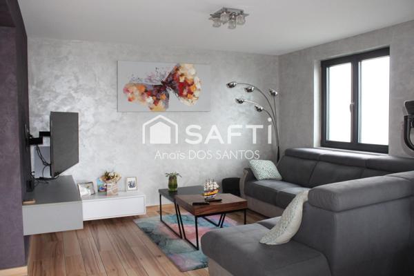 Maison spacieuse avec terrasse et jardin