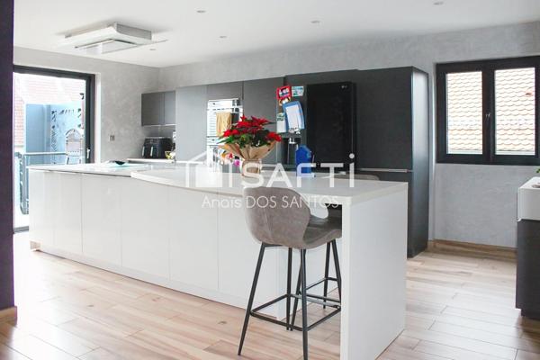 Maison spacieuse avec terrasse et jardin