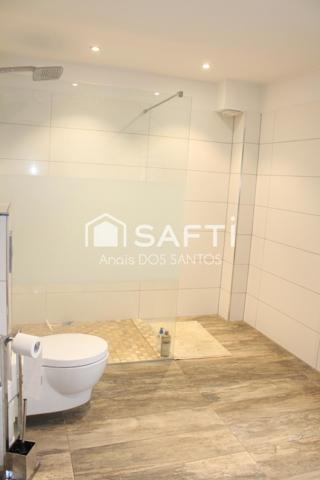 Maison spacieuse avec terrasse et jardin