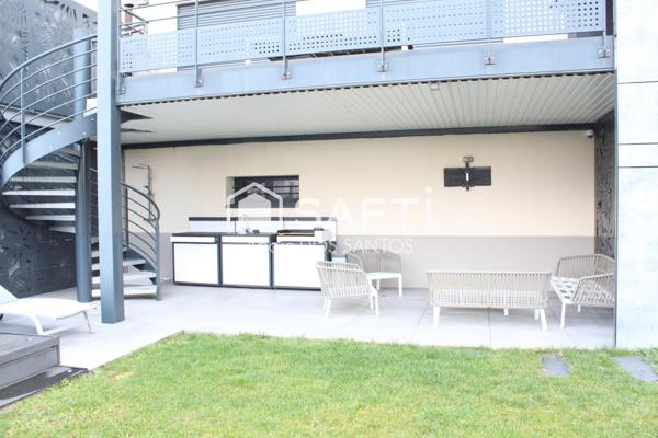 Maison spacieuse avec terrasse et jardin